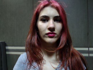 MegannRain webcam girl as a performer. Gallery photo 1.