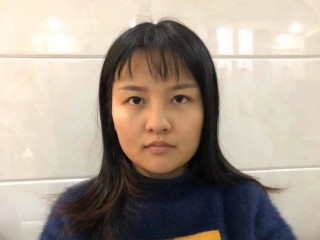 zhengxiaomin webcam girl as a performer. Gallery photo 1.