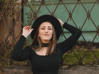 EnchantressQ webcam girl as a performer. Gallery photo 1.