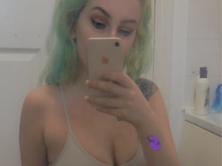 xCosmicGirl webcam girl as a performer. Gallery photo 3.