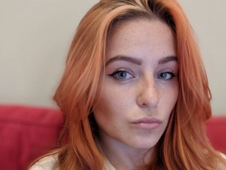 RedheadDaphne webcam girl as a performer. Gallery photo 1.