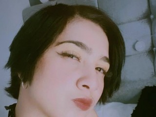 Leslyxxx webcam girl as a performer. Gallery photo 1.