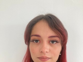 LucyGlow webcam girl as a performer. Gallery photo 1.