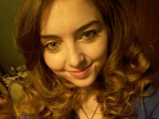 Lilly32Stone webcam girl as a performer. Gallery photo 1.