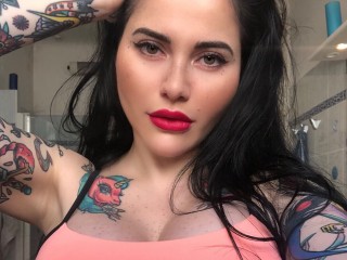 Aurorepariente webcam girl as a performer. Gallery photo 1.