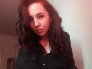 KissLina webcam girl as a performer. Gallery photo 2.