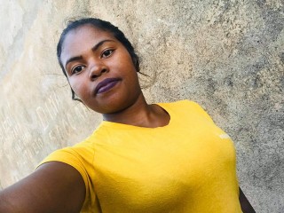 BombassBlack webcam girl as a performer. Gallery photo 1.