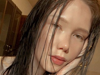 lily_lo webcam girl as a performer. Gallery photo 5.